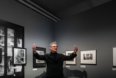<p><a href="https://galleries.seirer-photography.com">seirer-photography</a><br />Curator Gesturing at Photography Exhibition in Dark Gallery Space</p><p><a href="https://galleries.seirer-photography.com/Clients/Foto-Arsenal-Wien/2025-03-21-Grand-Opening/i-2tHvGN7" title="Curator Gesturing at Photography Exhibition in Dark Gallery Space"><img src="https://galleries.seirer-photography.com/Clients/Foto-Arsenal-Wien/2025-03-21-Grand-Opening/i-2tHvGN7/0/M9jXKnJMZ5rJG3K2zT55jPdNLjQHnjBKThHxRXkbR/Th/20250321_115325_foto_arsenal_eroeffnung_-Th.jpg" width="150" height="150" alt="Curator Gesturing at Photography Exhibition in Dark Gallery Space" title="Curator Gesturing at Photography Exhibition in Dark Gallery Space" style="border: 1px solid #000000;" /></a></p>