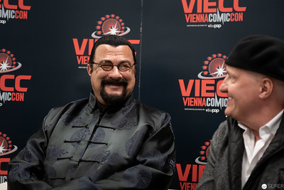 <p><a href="https://galleries.seirer-photography.com">seirer-photography</a><br />Steven Seagal at Vienna ComicCon 2019, Engaged in Conversation with Colleague</p><p><a href="https://galleries.seirer-photography.com/Events/2019/VIECC/Vienna-ComicCon-2019/i-JRTWJBd" title="Steven Seagal at Vienna ComicCon 2019, Engaged in Conversation with Colleague"><img src="https://galleries.seirer-photography.com/Events/2019/VIECC/Vienna-ComicCon-2019/i-JRTWJBd/0/MZST7v7c3zwXLtJcL5wzCXPDdqTX99THqg7DTFJmp/Th/20191123_131006-viecc_3585-Th.jpg" width="150" height="150" alt="Steven Seagal at Vienna ComicCon 2019, Engaged in Conversation with Colleague" title="Steven Seagal at Vienna ComicCon 2019, Engaged in Conversation with Colleague" style="border: 1px solid #000000;" /></a></p>