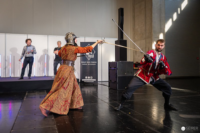 <p><a href="https://galleries.seirer-photography.com">seirer-photography</a><br />Historical Fencing Demonstration at Vienna ComicCon 2024 Showcases Theatrical Combat</p><p><a href="https://galleries.seirer-photography.com/Events/2024/VIECC/TheBestPhotos/i-48tC2DN" title="Historical Fencing Demonstration at Vienna ComicCon 2024 Showcases Theatrical Combat"><img src="https://galleries.seirer-photography.com/Events/2024/VIECC/TheBestPhotos/i-48tC2DN/0/NMJVfvxscrz2jLtPCgKdnSW5VwWsq86CmLSzgZDFv/Th/20241123_133238_viecc_2394-Th.jpg" width="150" height="150" alt="Historical Fencing Demonstration at Vienna ComicCon 2024 Showcases Theatrical Combat" title="Historical Fencing Demonstration at Vienna ComicCon 2024 Showcases Theatrical Combat" style="border: 1px solid #000000;" /></a></p>