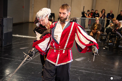 <p><a href="https://galleries.seirer-photography.com">seirer-photography</a><br />Historical Fencing Demonstration at Vienna ComicCon 2024 Cosplay Event</p><p><a href="https://galleries.seirer-photography.com/Events/2024/VIECC/TheBestPhotos/i-6zM5hKS" title="Historical Fencing Demonstration at Vienna ComicCon 2024 Cosplay Event"><img src="https://galleries.seirer-photography.com/Events/2024/VIECC/TheBestPhotos/i-6zM5hKS/0/NJSqww3CdNpdjKjhmm6JfTZtjj3G6RL4gpKkM9Qw2/Th/20241123_133552_viecc_2634-Th.jpg" width="150" height="150" alt="Historical Fencing Demonstration at Vienna ComicCon 2024 Cosplay Event" title="Historical Fencing Demonstration at Vienna ComicCon 2024 Cosplay Event" style="border: 1px solid #000000;" /></a></p>