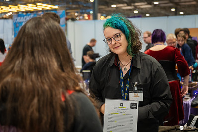 <p><a href="https://galleries.seirer-photography.com">seirer-photography</a><br />Staff Member at Vienna Comic Con 2024 Engagement Booth</p><p><a href="https://galleries.seirer-photography.com/Events/2024/VIECC/TheBestPhotos/i-8krz87D" title="Staff Member at Vienna Comic Con 2024 Engagement Booth"><img src="https://galleries.seirer-photography.com/Events/2024/VIECC/TheBestPhotos/i-8krz87D/0/MCVfV4hxtMw69gmmrQFX56cMSm94S3zzN3f8zFCqz/Th/20241123_143439_viecc_3137-Th.jpg" width="150" height="150" alt="Staff Member at Vienna Comic Con 2024 Engagement Booth" title="Staff Member at Vienna Comic Con 2024 Engagement Booth" style="border: 1px solid #000000;" /></a></p>