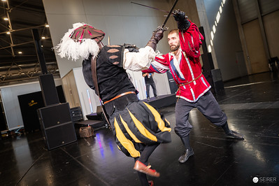 <p><a href="https://galleries.seirer-photography.com">seirer-photography</a><br />Cosplay Fight Scene at Vienna ComicCon 2024 Showcasing Dynamic Combat Performance</p><p><a href="https://galleries.seirer-photography.com/Events/2024/VIECC/TheBestPhotos/i-95TKdGC" title="Cosplay Fight Scene at Vienna ComicCon 2024 Showcasing Dynamic Combat Performance"><img src="https://galleries.seirer-photography.com/Events/2024/VIECC/TheBestPhotos/i-95TKdGC/0/K4GwRrWcKGZHCfr2Kv2GrmwQXKS8cH7W3xPmb3xK7/Th/20241123_132930_viecc_2302-Th.jpg" width="150" height="150" alt="Cosplay Fight Scene at Vienna ComicCon 2024 Showcasing Dynamic Combat Performance" title="Cosplay Fight Scene at Vienna ComicCon 2024 Showcasing Dynamic Combat Performance" style="border: 1px solid #000000;" /></a></p>