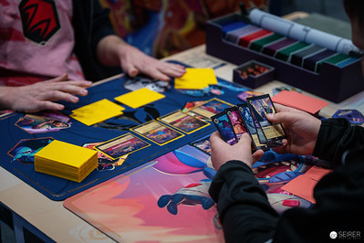 <p><a href="https://galleries.seirer-photography.com">seirer-photography</a><br />Card Game Players at Vienna ComicCon 2024 Trading Strategy Battle</p><p><a href="https://galleries.seirer-photography.com/Events/2024/VIECC/TheBestPhotos/i-CscjtK8" title="Card Game Players at Vienna ComicCon 2024 Trading Strategy Battle"><img src="https://galleries.seirer-photography.com/Events/2024/VIECC/TheBestPhotos/i-CscjtK8/0/LRJ9CpM6bQ7JCDSPKZvxbJBgksf5tVBVb4gJRRRp4/Th/20241123_124103_viecc_2060-Th.jpg" width="150" height="150" alt="Card Game Players at Vienna ComicCon 2024 Trading Strategy Battle" title="Card Game Players at Vienna ComicCon 2024 Trading Strategy Battle" style="border: 1px solid #000000;" /></a></p>