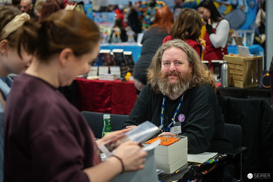<p><a href="https://galleries.seirer-photography.com">seirer-photography</a><br />Bearded Comic Con Attendee Smiling at VIECC 2024 Vendor Table</p><p><a href="https://galleries.seirer-photography.com/Events/2024/VIECC/TheBestPhotos/i-F6RQfK5" title="Bearded Comic Con Attendee Smiling at VIECC 2024 Vendor Table"><img src="https://galleries.seirer-photography.com/Events/2024/VIECC/TheBestPhotos/i-F6RQfK5/0/KwZzNvX4X8pVGKfs2vPCdr7cnHSdLxFNj6Z4G3LHL/Th/20241123_143346_viecc_3121-Th.jpg" width="150" height="150" alt="Bearded Comic Con Attendee Smiling at VIECC 2024 Vendor Table" title="Bearded Comic Con Attendee Smiling at VIECC 2024 Vendor Table" style="border: 1px solid #000000;" /></a></p>