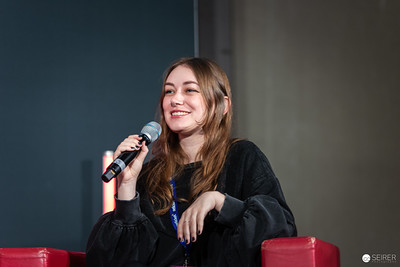 <p><a href="https://galleries.seirer-photography.com">seirer-photography</a><br />Young Speaker Presenting at Vienna ComicCon 2024 Panel Discussion</p><p><a href="https://galleries.seirer-photography.com/Events/2024/VIECC/TheBestPhotos/i-VbbMSVN" title="Young Speaker Presenting at Vienna ComicCon 2024 Panel Discussion"><img src="https://galleries.seirer-photography.com/Events/2024/VIECC/TheBestPhotos/i-VbbMSVN/0/MffWhG2HrC9zxBCXKgqTmgcH6tQXpXjqCbXsbsZSz/Th/20241123_121934_viecc_5474-Th.jpg" width="150" height="150" alt="Young Speaker Presenting at Vienna ComicCon 2024 Panel Discussion" title="Young Speaker Presenting at Vienna ComicCon 2024 Panel Discussion" style="border: 1px solid #000000;" /></a></p>