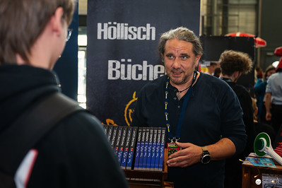 <p><a href="https://galleries.seirer-photography.com">seirer-photography</a><br />Hölltisch Bücher Book Seller at Vienna Event Showcasing Literary Collection</p><p><a href="https://galleries.seirer-photography.com/Events/2024/VIECC/TheBestPhotos/i-ZBzRspZ" title="Hölltisch Bücher Book Seller at Vienna Event Showcasing Literary Collection"><img src="https://galleries.seirer-photography.com/Events/2024/VIECC/TheBestPhotos/i-ZBzRspZ/0/M3K5CF6pCp2QvphKPxxL5nrPcpjvDtJrLscCtQfgs/Th/20241123_145216_viecc_3178-Th.jpg" width="150" height="150" alt="Hölltisch Bücher Book Seller at Vienna Event Showcasing Literary Collection" title="Hölltisch Bücher Book Seller at Vienna Event Showcasing Literary Collection" style="border: 1px solid #000000;" /></a></p>