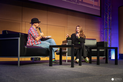 <p><a href="https://galleries.seirer-photography.com">seirer-photography</a><br />Panel Discussion at Vienna ComicCon 2024 with Seated Presenter and Interviewer</p><p><a href="https://galleries.seirer-photography.com/Events/2024/VIECC/TheBestPhotos/i-dBTG7r8" title="Panel Discussion at Vienna ComicCon 2024 with Seated Presenter and Interviewer"><img src="https://galleries.seirer-photography.com/Events/2024/VIECC/TheBestPhotos/i-dBTG7r8/0/Nd4GGXGBbdtGPh9ss72836n5hHrdHfCvWNV5MLKH5/Th/20241123_120941_viecc_1965-Th.jpg" width="150" height="150" alt="Panel Discussion at Vienna ComicCon 2024 with Seated Presenter and Interviewer" title="Panel Discussion at Vienna ComicCon 2024 with Seated Presenter and Interviewer" style="border: 1px solid #000000;" /></a></p>