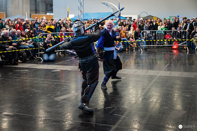 <p><a href="https://galleries.seirer-photography.com">seirer-photography</a><br />Medieval Combat Performance at Vienna ComicCon 2024 Sword Fighting Arena</p><p><a href="https://galleries.seirer-photography.com/Events/2024/VIECC/TheBestPhotos/i-dnCLn7s" title="Medieval Combat Performance at Vienna ComicCon 2024 Sword Fighting Arena"><img src="https://galleries.seirer-photography.com/Events/2024/VIECC/TheBestPhotos/i-dnCLn7s/0/KXJ6wqp5qvH3SV24SjsHwXq29GwK2xCgVh9DLQDCR/Th/20241123_145352_viecc_3188-Th.jpg" width="150" height="150" alt="Medieval Combat Performance at Vienna ComicCon 2024 Sword Fighting Arena" title="Medieval Combat Performance at Vienna ComicCon 2024 Sword Fighting Arena" style="border: 1px solid #000000;" /></a></p>