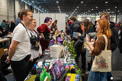 <p><a href="https://galleries.seirer-photography.com">seirer-photography</a><br />Vendors and Attendees at Vienna ComicCon 2024 Merchandise Booth</p><p><a href="https://galleries.seirer-photography.com/Events/2024/VIECC/TheBestPhotos/i-f4rhsXM" title="Vendors and Attendees at Vienna ComicCon 2024 Merchandise Booth"><img src="https://galleries.seirer-photography.com/Events/2024/VIECC/TheBestPhotos/i-f4rhsXM/0/NWf45nKkwF9twf3NkwXgTXJTbfJ2KWQs6MDqZfbvf/Th/20241123_142708_viecc_3043-Th.jpg" width="150" height="150" alt="Vendors and Attendees at Vienna ComicCon 2024 Merchandise Booth" title="Vendors and Attendees at Vienna ComicCon 2024 Merchandise Booth" style="border: 1px solid #000000;" /></a></p>