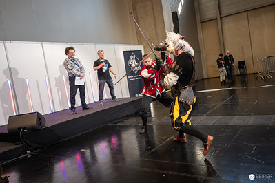 <p><a href="https://galleries.seirer-photography.com">seirer-photography</a><br />Cosplay Sword Fight at Vienna ComicCon 2024 Stage Performance</p><p><a href="https://galleries.seirer-photography.com/Events/2024/VIECC/TheBestPhotos/i-fW6XJXq" title="Cosplay Sword Fight at Vienna ComicCon 2024 Stage Performance"><img src="https://galleries.seirer-photography.com/Events/2024/VIECC/TheBestPhotos/i-fW6XJXq/0/NgHF4FQ3d4q2qvRzPmfpHDsg8nmLs7BbDhLq9gJMr/Th/20241123_132850_viecc_2225-Th.jpg" width="150" height="150" alt="Cosplay Sword Fight at Vienna ComicCon 2024 Stage Performance" title="Cosplay Sword Fight at Vienna ComicCon 2024 Stage Performance" style="border: 1px solid #000000;" /></a></p>