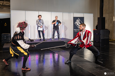 <p><a href="https://galleries.seirer-photography.com">seirer-photography</a><br />Historical European Fencing Demonstration at Vienna ComicCon 2024</p><p><a href="https://galleries.seirer-photography.com/Events/2024/VIECC/TheBestPhotos/i-hM4ZM4m" title="Historical European Fencing Demonstration at Vienna ComicCon 2024"><img src="https://galleries.seirer-photography.com/Events/2024/VIECC/TheBestPhotos/i-hM4ZM4m/0/L3WjNvWnNn4GPZq79jJgZhGr8xjPD7WwzxfDh6n7D/Th/20241123_132923_viecc_2283-Th.jpg" width="150" height="150" alt="Historical European Fencing Demonstration at Vienna ComicCon 2024" title="Historical European Fencing Demonstration at Vienna ComicCon 2024" style="border: 1px solid #000000;" /></a></p>