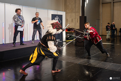 <p><a href="https://galleries.seirer-photography.com">seirer-photography</a><br />Medieval Combat Demonstration at Vienna ComicCon 2024 Sword Fighting Stage</p><p><a href="https://galleries.seirer-photography.com/Events/2024/VIECC/TheBestPhotos/i-j7pGNBB" title="Medieval Combat Demonstration at Vienna ComicCon 2024 Sword Fighting Stage"><img src="https://galleries.seirer-photography.com/Events/2024/VIECC/TheBestPhotos/i-j7pGNBB/0/MMhjNMdNd4VBZSD4rhwXvfHrkPMM3LmvzX5rzdbMx/Th/20241123_132849_viecc_2220-Th.jpg" width="150" height="150" alt="Medieval Combat Demonstration at Vienna ComicCon 2024 Sword Fighting Stage" title="Medieval Combat Demonstration at Vienna ComicCon 2024 Sword Fighting Stage" style="border: 1px solid #000000;" /></a></p>