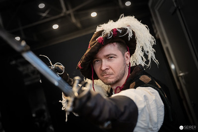 <p><a href="https://galleries.seirer-photography.com">seirer-photography</a><br />Costumed Performer with Feathered Hat and Musket at Vienna ComicCon 2024</p><p><a href="https://galleries.seirer-photography.com/Events/2024/VIECC/TheBestPhotos/i-m2XJBz4" title="Costumed Performer with Feathered Hat and Musket at Vienna ComicCon 2024"><img src="https://galleries.seirer-photography.com/Events/2024/VIECC/TheBestPhotos/i-m2XJBz4/0/NS8BGTkWtt73fRHXcWwTSjz2MsWvgmXN3bCphbFvc/Th/20241123_133808_viecc_2684-Th.jpg" width="150" height="150" alt="Costumed Performer with Feathered Hat and Musket at Vienna ComicCon 2024" title="Costumed Performer with Feathered Hat and Musket at Vienna ComicCon 2024" style="border: 1px solid #000000;" /></a></p>