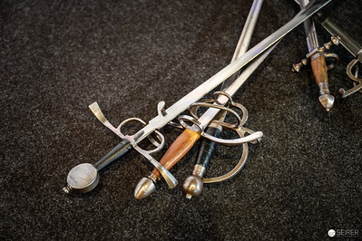 <p><a href="https://galleries.seirer-photography.com">seirer-photography</a><br />Vintage European Swords Displayed on Dark Background</p><p><a href="https://galleries.seirer-photography.com/Events/2024/VIECC/TheBestPhotos/i-xHM9pvH" title="Vintage European Swords Displayed on Dark Background"><img src="https://galleries.seirer-photography.com/Events/2024/VIECC/TheBestPhotos/i-xHM9pvH/0/KK6r3Hc2XzNxGPpHVRc55DbBMKjPRW7D3FFH8fhSd/Th/20241123_130918_viecc_2180-Th.jpg" width="150" height="150" alt="Vintage European Swords Displayed on Dark Background" title="Vintage European Swords Displayed on Dark Background" style="border: 1px solid #000000;" /></a></p>