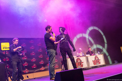 <p><a href="https://galleries.seirer-photography.com">seirer-photography</a><br />Costumed Performer Interacting with Host at Vienna ComicCon 2015 Stage</p><p><a href="https://galleries.seirer-photography.com/Events/ViennaComicCon2015/CosplayContest/i-PXP5gV4" title="Costumed Performer Interacting with Host at Vienna ComicCon 2015 Stage"><img src="https://galleries.seirer-photography.com/Events/ViennaComicCon2015/CosplayContest/i-PXP5gV4/0/MS84PzTd5gqgWZvfXLFk3XNH36KWnh95wWK6JVWQN/Th/2015-11-21-17-15-44_viecc_cosplay_7968-Th.jpg" width="150" height="150" alt="Costumed Performer Interacting with Host at Vienna ComicCon 2015 Stage" title="Costumed Performer Interacting with Host at Vienna ComicCon 2015 Stage" style="border: 1px solid #000000;" /></a></p>