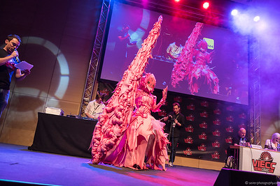 <p><a href="https://galleries.seirer-photography.com">seirer-photography</a><br />Elaborate Pink Costumed Performer on Stage at Vienna ComicCon 2015 Cosplay Contest</p><p><a href="https://galleries.seirer-photography.com/Events/ViennaComicCon2015/CosplayContest/i-nWHqfwd" title="Elaborate Pink Costumed Performer on Stage at Vienna ComicCon 2015 Cosplay Contest"><img src="https://galleries.seirer-photography.com/Events/ViennaComicCon2015/CosplayContest/i-nWHqfwd/0/MXFf9PddX8GSVwVrp7vmqv7hCbzCFdGhMwxjWVvsS/Th/2015-11-21-17-07-37_viecc_cosplay_7775-Th.jpg" width="150" height="150" alt="Elaborate Pink Costumed Performer on Stage at Vienna ComicCon 2015 Cosplay Contest" title="Elaborate Pink Costumed Performer on Stage at Vienna ComicCon 2015 Cosplay Contest" style="border: 1px solid #000000;" /></a></p>