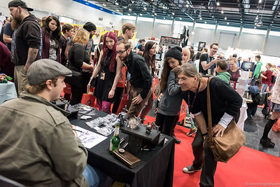 <p><a href="https://galleries.seirer-photography.com">seirer-photography</a><br />Vienna ComicCon 2015: Attendees Examining Merchandise at Exhibition Booth</p><p><a href="https://galleries.seirer-photography.com/Events/ViennaComicCon2015/Vienna-ComicCon/i-ZRhqw2W" title="Vienna ComicCon 2015: Attendees Examining Merchandise at Exhibition Booth"><img src="https://galleries.seirer-photography.com/Events/ViennaComicCon2015/Vienna-ComicCon/i-ZRhqw2W/0/MLs6x8HCRx8btvwz4NL5D6rRhXpjwhdWBLSrhtMv9/Th/2015-11-21-11-23-36_viecc_7023-Th.jpg" width="150" height="150" alt="Vienna ComicCon 2015: Attendees Examining Merchandise at Exhibition Booth" title="Vienna ComicCon 2015: Attendees Examining Merchandise at Exhibition Booth" style="border: 1px solid #000000;" /></a></p>