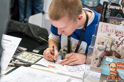 <p><a href="https://galleries.seirer-photography.com">seirer-photography</a><br />VIECC 2015: Young Artist Sketching at Vienna Comic Convention Booth</p><p><a href="https://galleries.seirer-photography.com/Events/ViennaComicCon2015/Vienna-ComicCon/i-twzFJ8p" title="VIECC 2015: Young Artist Sketching at Vienna Comic Convention Booth"><img src="https://galleries.seirer-photography.com/Events/ViennaComicCon2015/Vienna-ComicCon/i-twzFJ8p/0/NSdGD6cQWc8zKjCF8JXv5N6WqVZJnx5qsdkvpF5NC/Th/2015-11-21-11-17-44_viecc_7009-Th.jpg" width="150" height="150" alt="VIECC 2015: Young Artist Sketching at Vienna Comic Convention Booth" title="VIECC 2015: Young Artist Sketching at Vienna Comic Convention Booth" style="border: 1px solid #000000;" /></a></p>